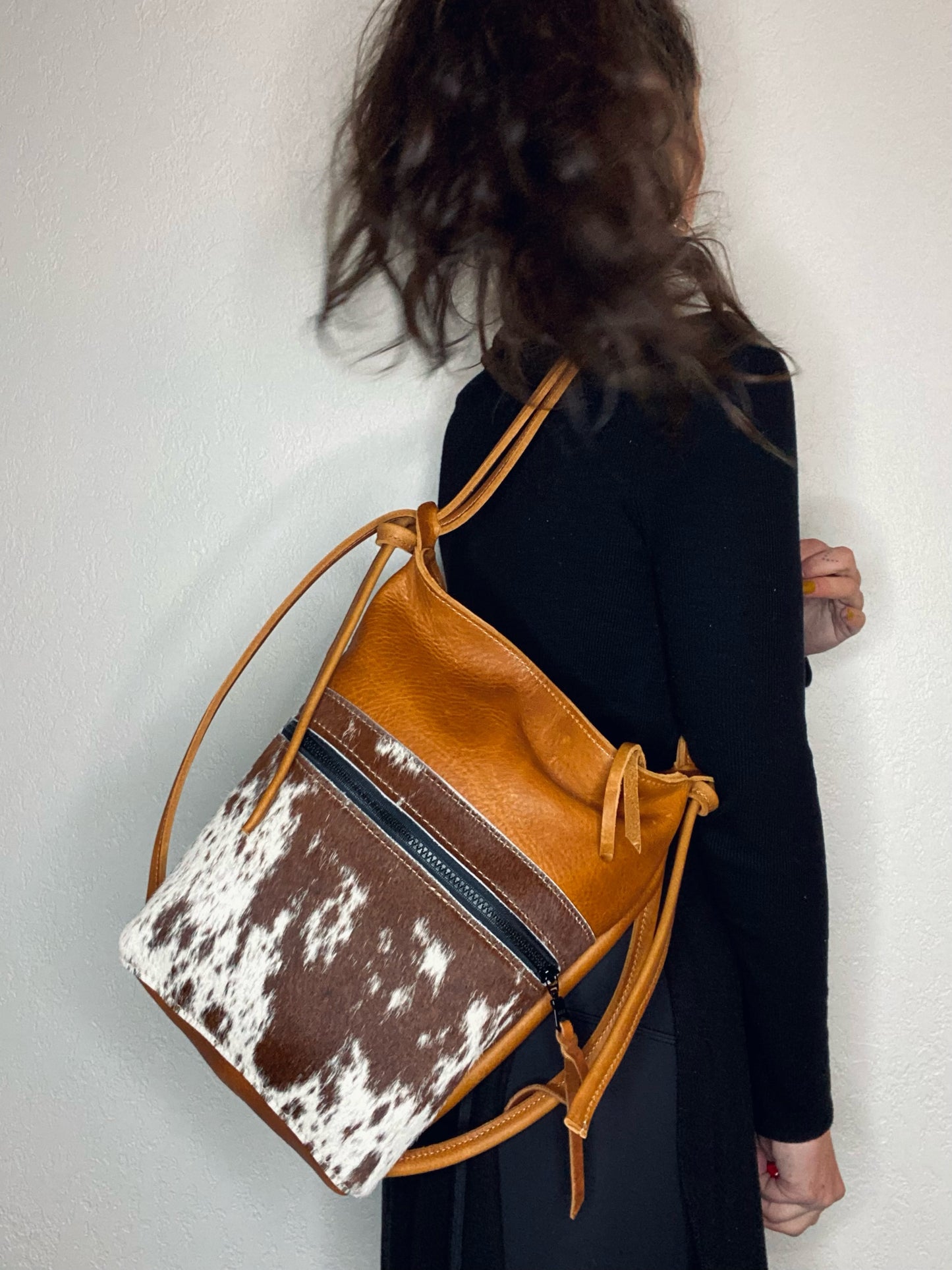 The Jack Bag in Rustic Whisky Oiltan Leather With Speckled Brown and White Hair on Hide Front Pocket